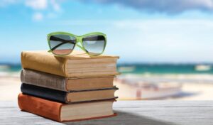 reading books on beach 1024x600